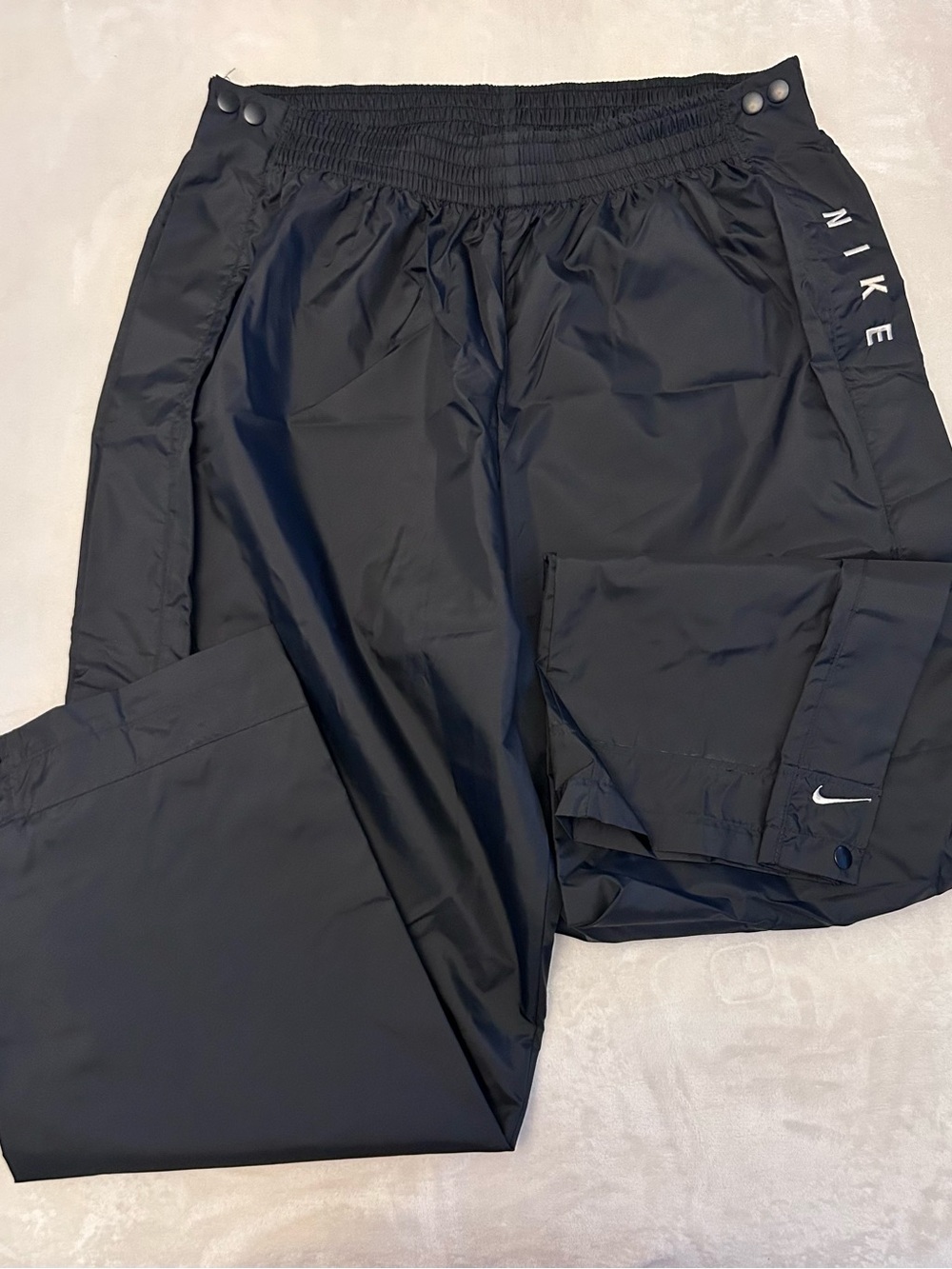 Nike Black Lightweight Track Pants with Swoosh and Snap Details